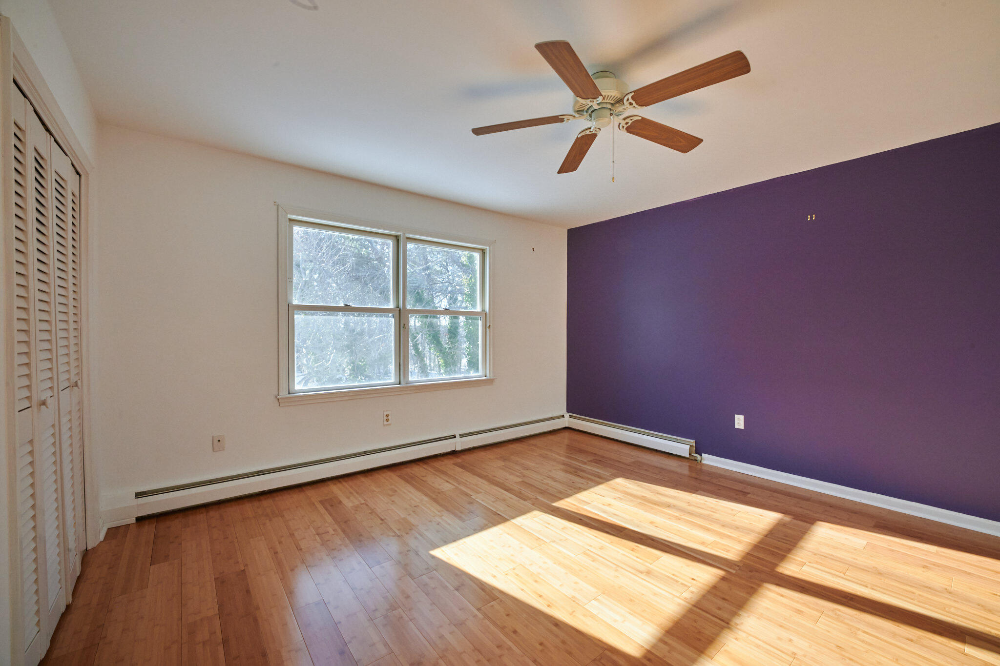 14 Harold Street, Unit 14A Harwich Port, MA 02646 - Photo 16 of 23 a view of an empty room with wooden floor and a window