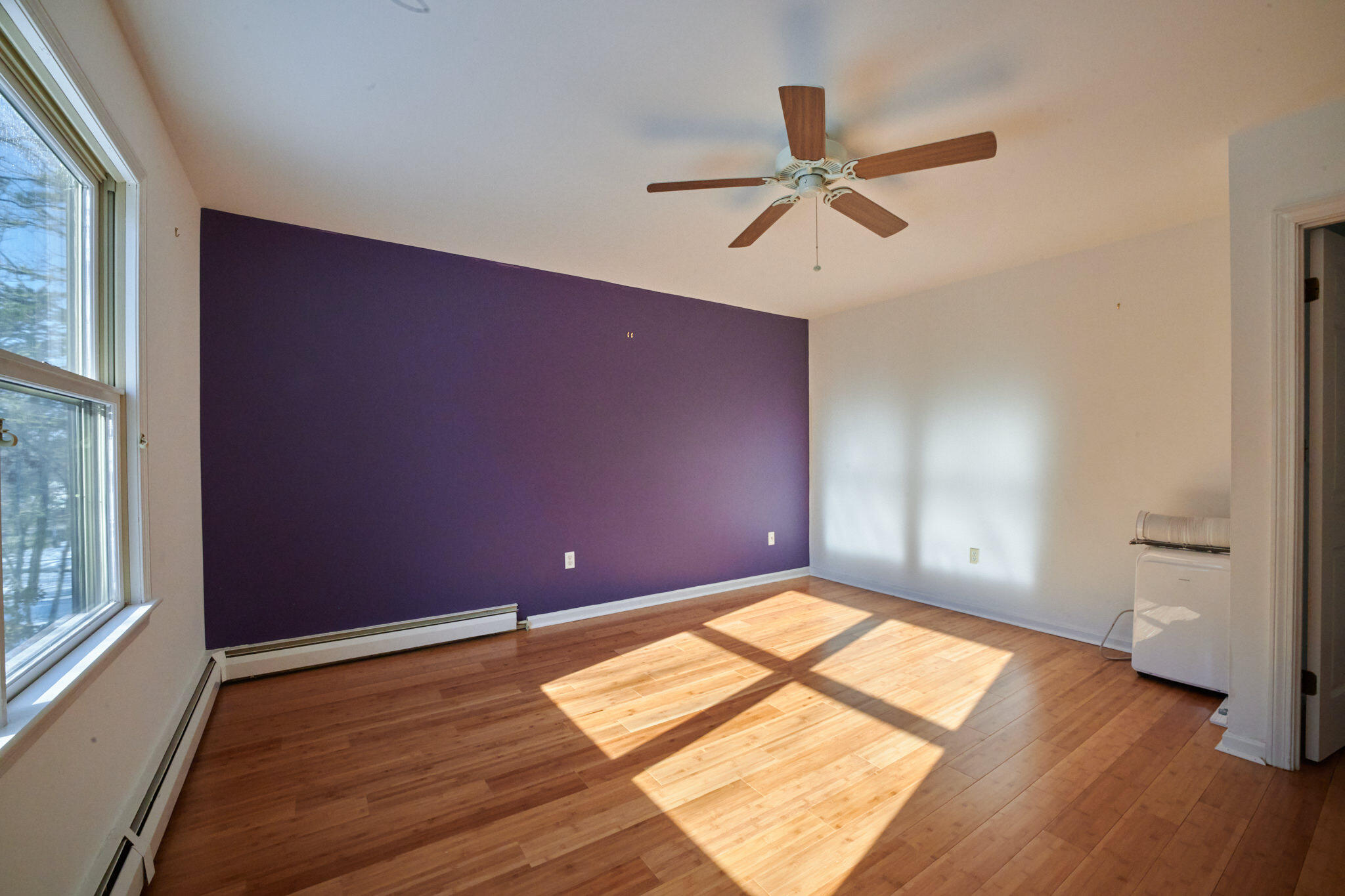 14 Harold Street, Unit 14A Harwich Port, MA 02646 - Photo 17 of 23 a view of empty room with wooden floor and fan