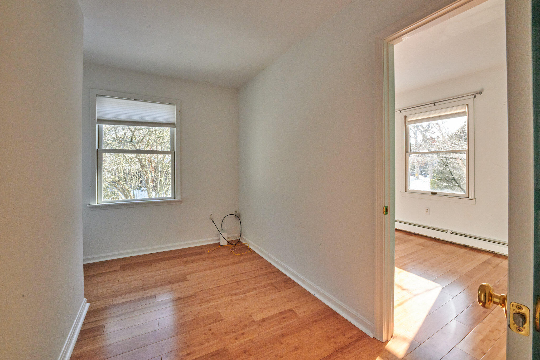 14 Harold Street, Unit 14A Harwich Port, MA 02646 - Photo 19 of 23 an empty room with wooden floor and windows
