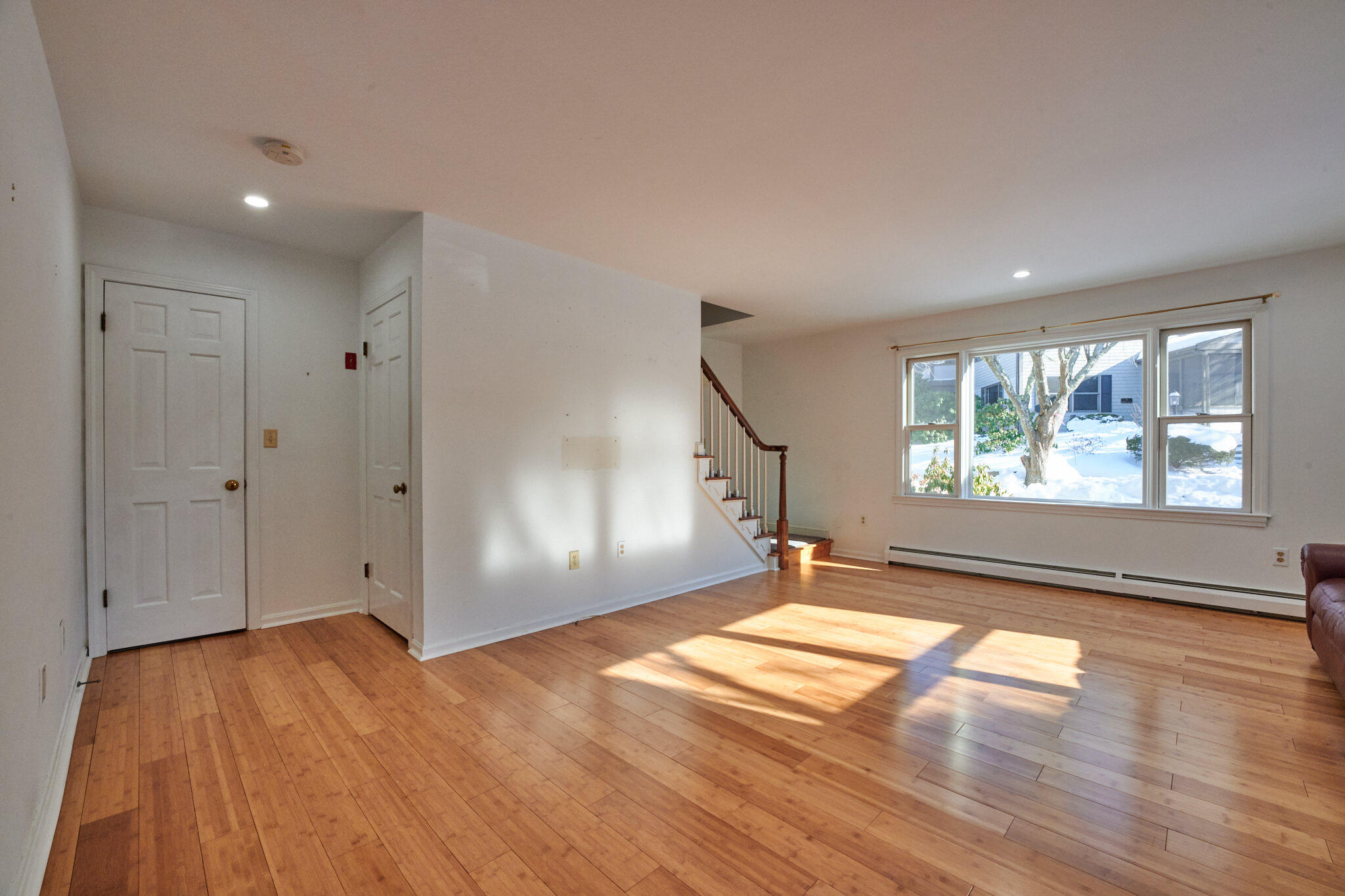 14 Harold Street, Unit 14A Harwich Port, MA 02646 - Photo 4 of 23 wooden floor in an empty room with a window