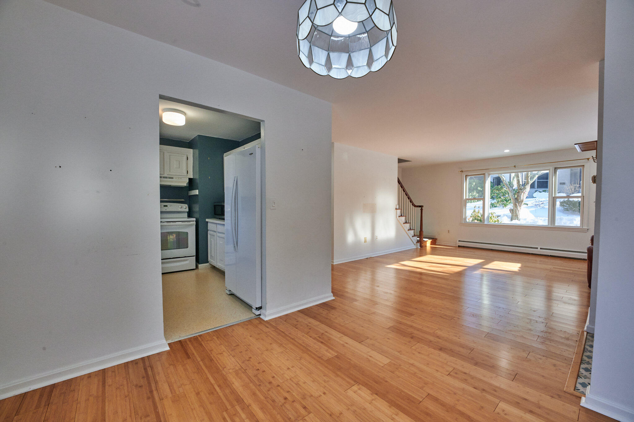14 Harold Street, Unit 14A Harwich Port, MA 02646 - Photo 7 of 23 wooden floor in a hall with a window