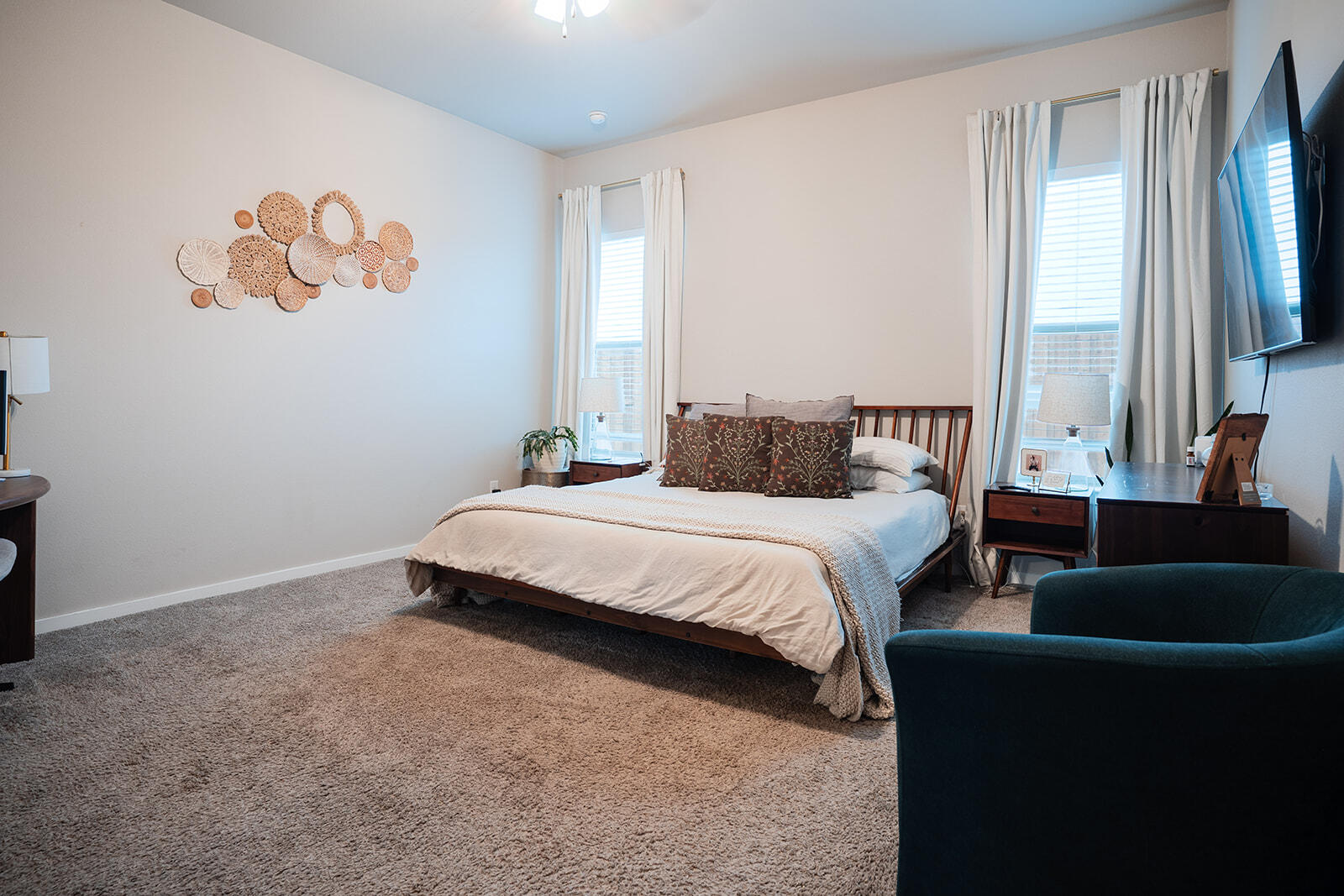 1927 142nd Street Lubbock, TX 79423 - Photo 12 of 58 a bedroom with a bed and a couch