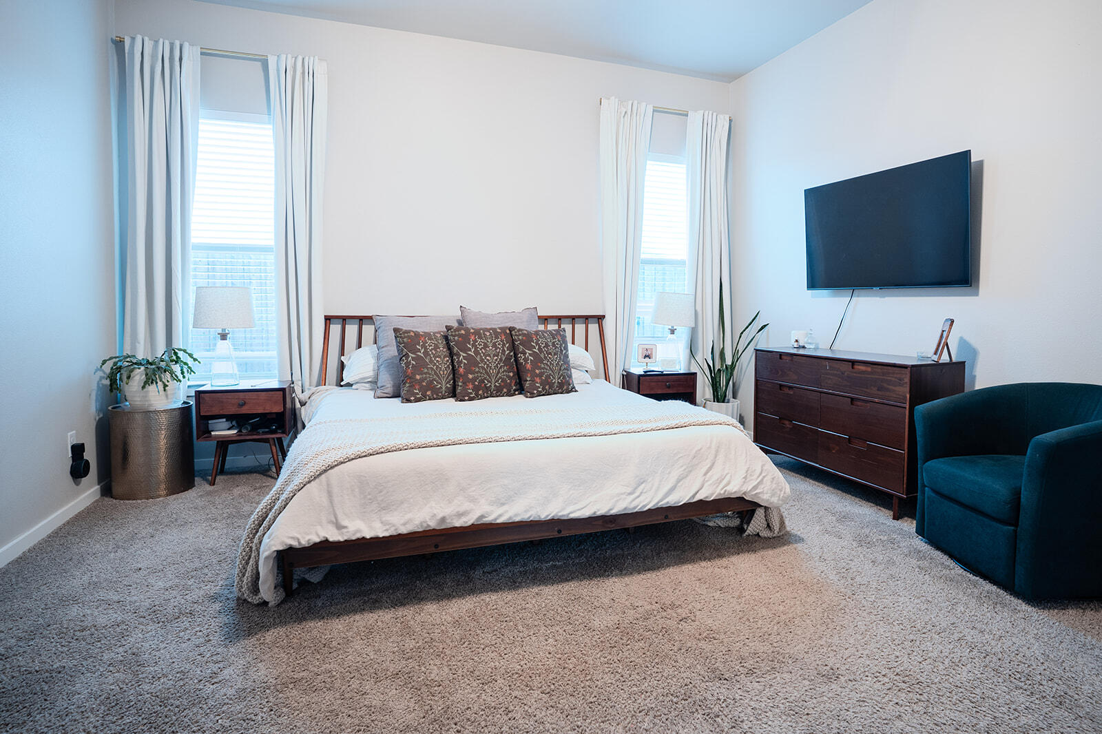 1927 142nd Street Lubbock, TX 79423 - Photo 13 of 58 a spacious bedroom with a bed and a flat screen television