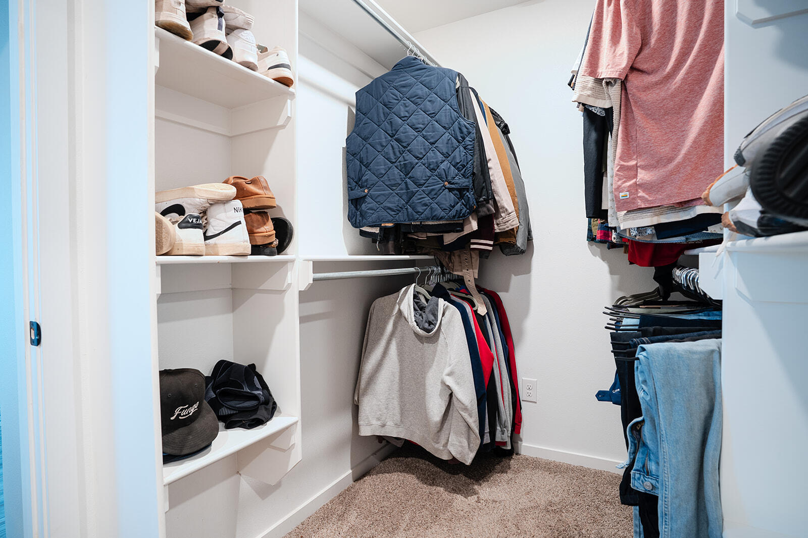 1927 142nd Street Lubbock, TX 79423 - Photo 20 of 58 a view of walk in closet with clothes and shoes