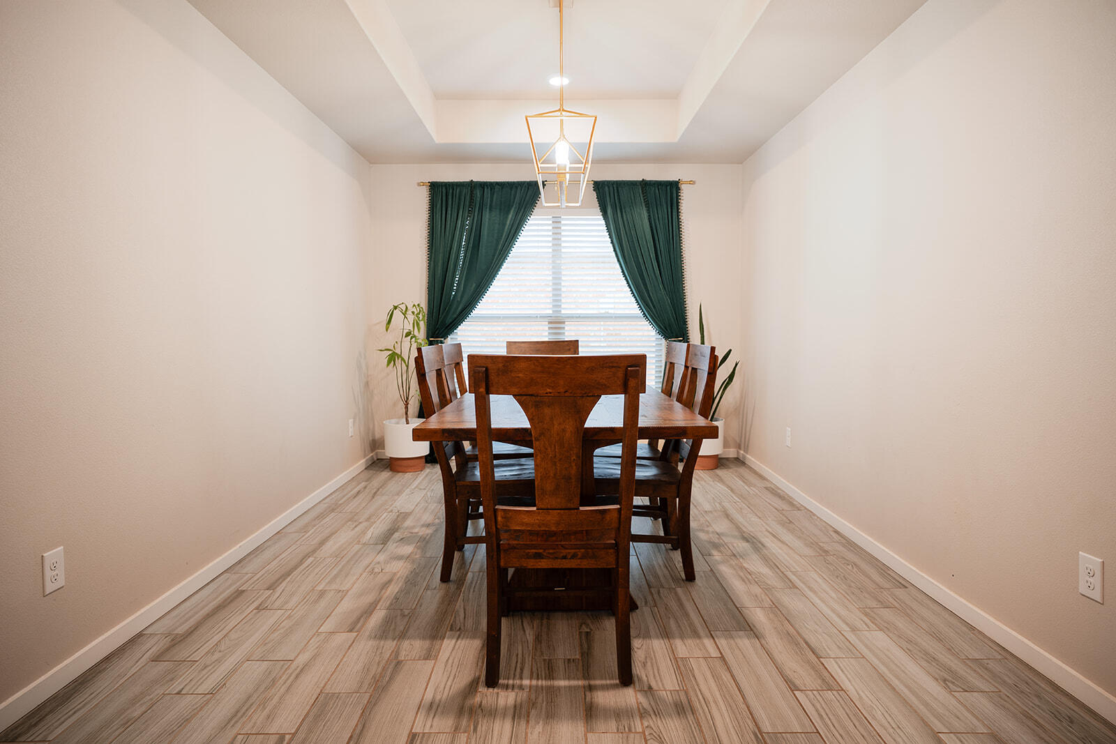 1927 142nd Street Lubbock, TX 79423 - Photo 31 of 58 a dining room with furniture and wooden floor