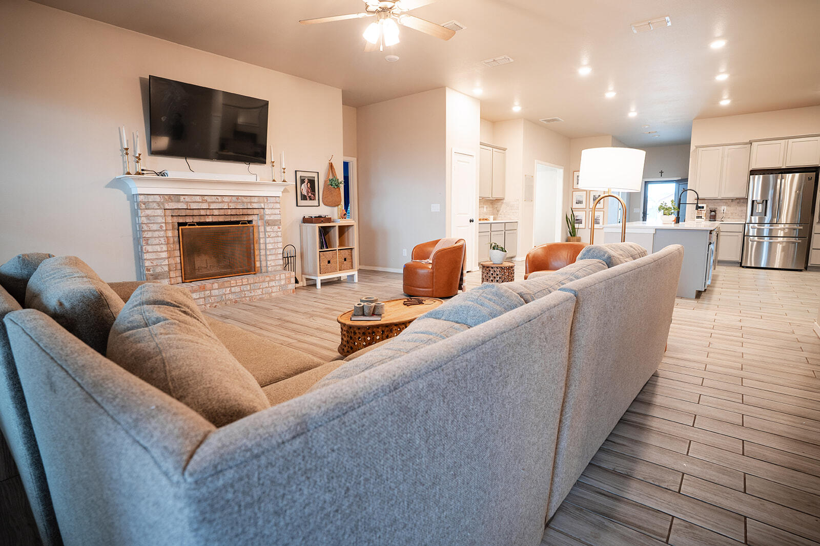 1927 142nd Street Lubbock, TX 79423 - Photo 42 of 58 a living room with furniture fireplace and flat screen tv