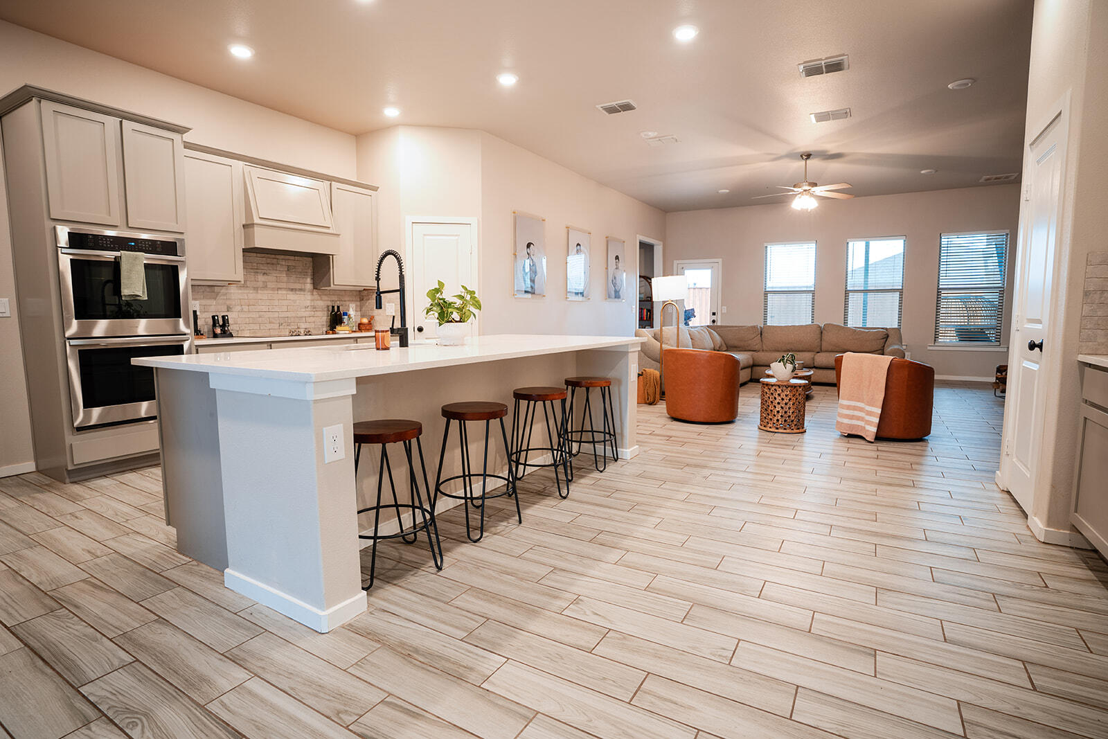 1927 142nd Street Lubbock, TX 79423 - Photo 46 of 58 a large kitchen with stainless steel appliances lots of counter space and windows
