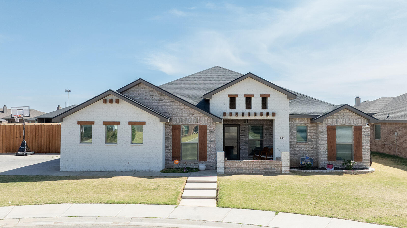 1927 142nd Street Lubbock, TX 79423 - Photo 58 of 58 a front view of a house with yard and parking