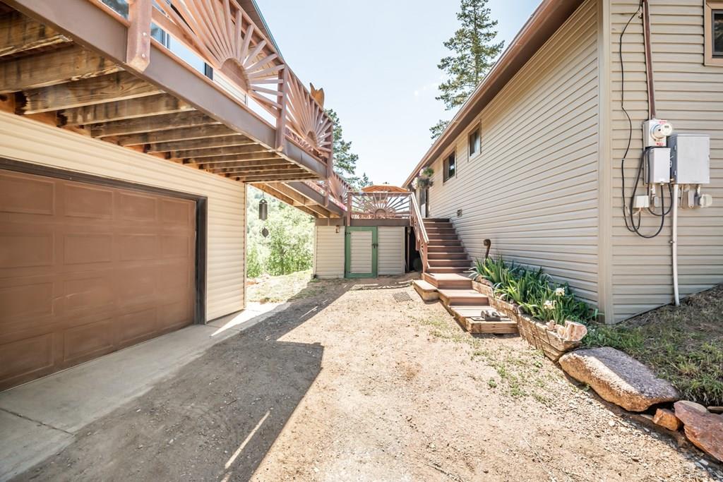 9600 Middle Creek Canyon Road Beulah, CO 81023 - Photo 5 of 50 a view of a house with a yard