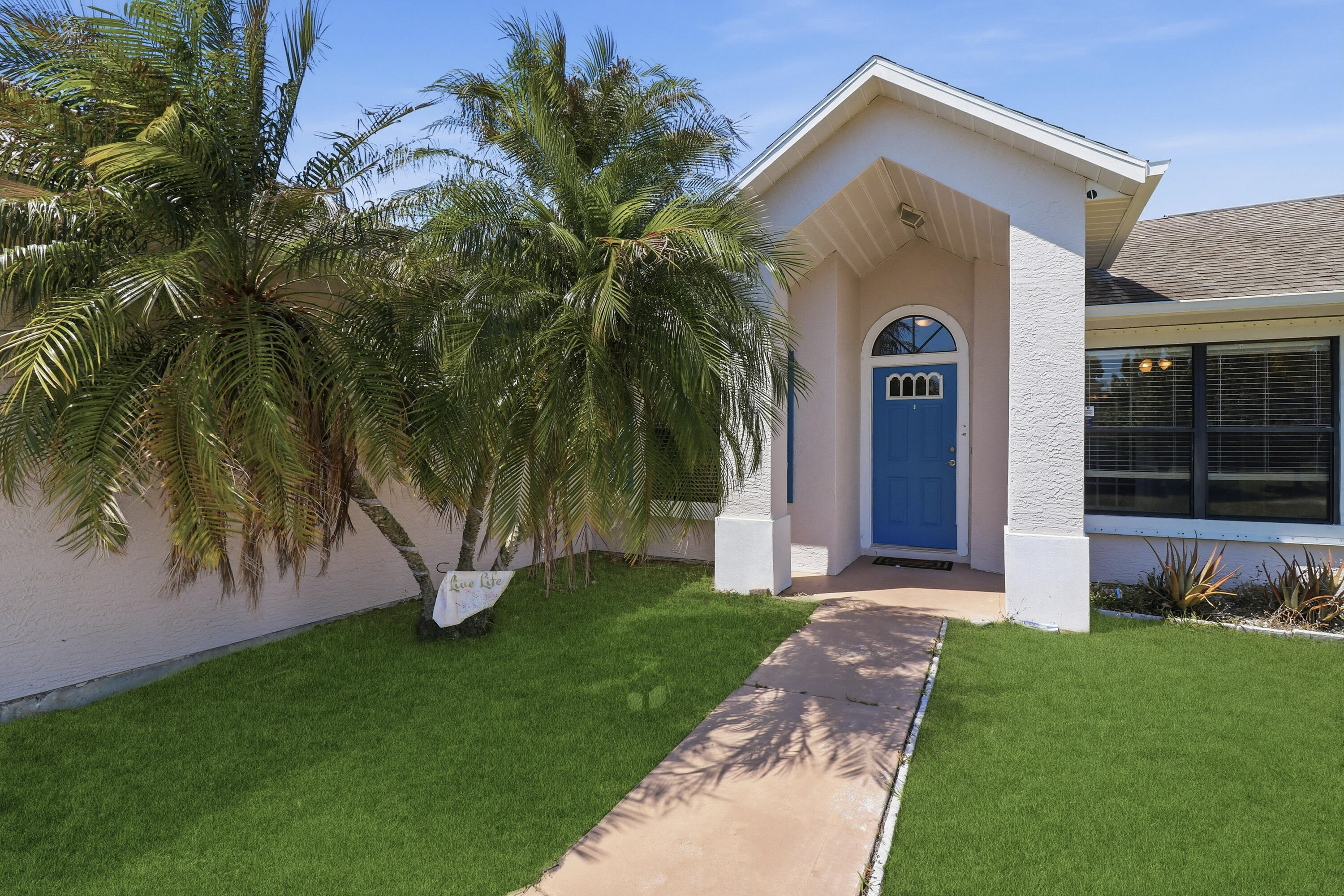 183 Southwest Hide Place Port St. Lucie, FL 34953 - Photo 14 of 19 12-IMG_8771_with_grass