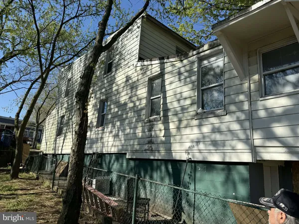 a view of swimming pool with a patio