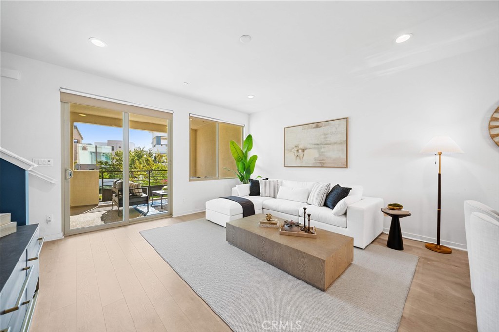 115 Episode Irvine, CA 92618 - Photo 20 of 43 a living room with furniture and large window