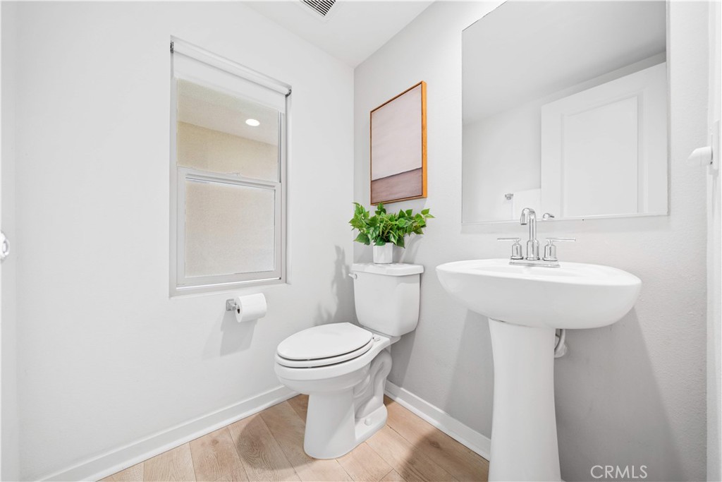 115 Episode Irvine, CA 92618 - Photo 25 of 43 a bathroom with a sink toilet and a mirror