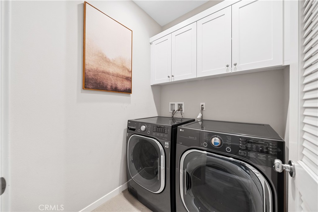 115 Episode Irvine, CA 92618 - Photo 26 of 43 a utility room with dryer and washer
