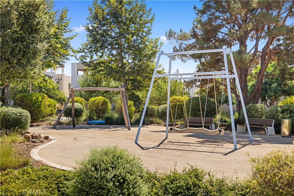 115 Episode Irvine, CA 92618 - Photo 39 of 43 a view of a park with swings and slides