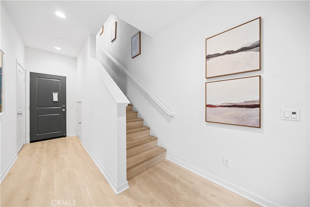115 Episode Irvine, CA 92618 - Photo 5 of 43 a view of a hallway with staircase
