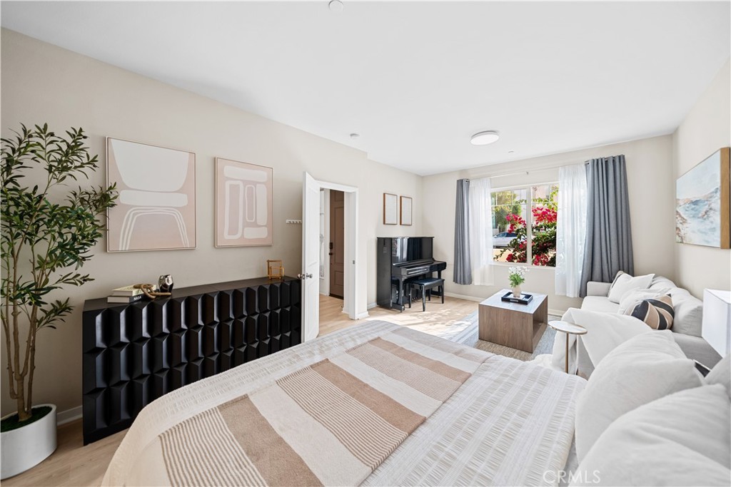 115 Episode Irvine, CA 92618 - Photo 10 of 43 a bed room with a bed and a chair