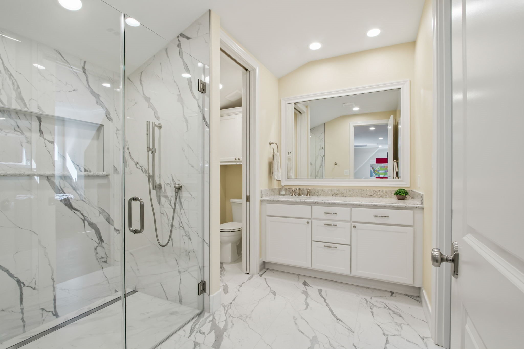 36702 Deer Valley Magnolia, TX 77355 - Photo 27 of 46 a bathroom with a shower sink and mirror