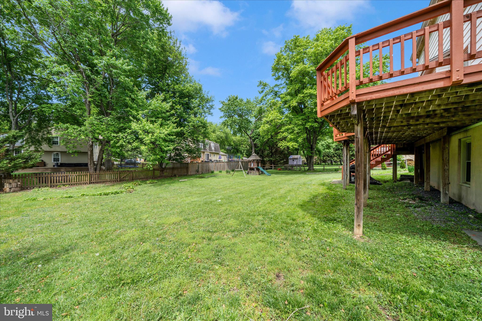 16000 Narrows Terrace Silver Spring, MD 20906 - Photo 50 of 54 a backyard of a house with plants and large tree