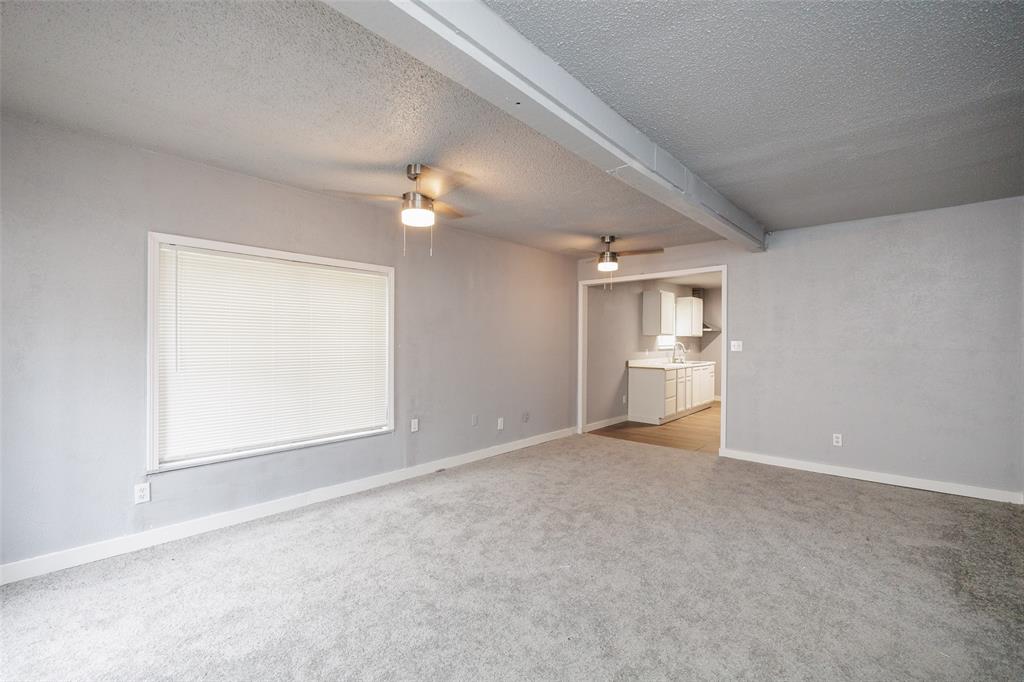 100 San Diego Street Odem, TX 78370 - Photo 1 of 23 an empty room with a bathroom and a window