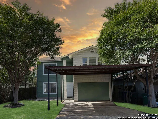 a house view with a garden space