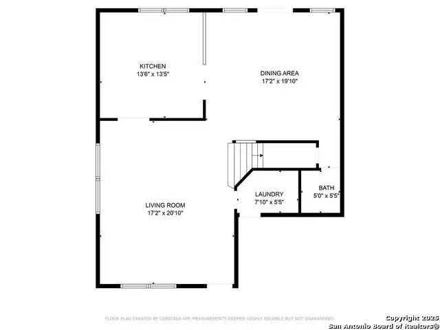 a picture of a bench in front of a wall