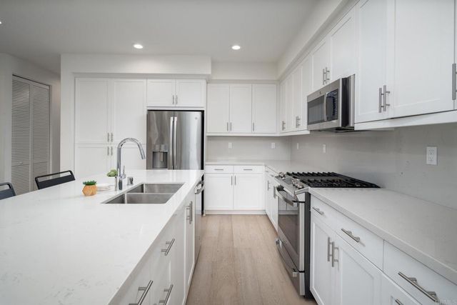 $1,085,000 | 6164 Colt Place, Unit 102, Carlsbad, CA 92009