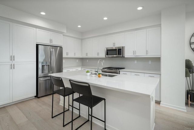 $1,085,000 | 6164 Colt Place, Unit 102, Carlsbad, CA 92009