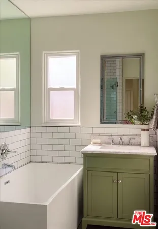 a bathroom with a sink and a bathtub