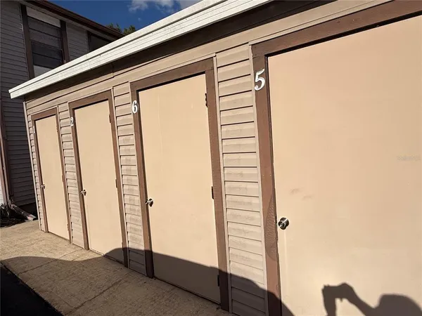 a view of a tree with a yard