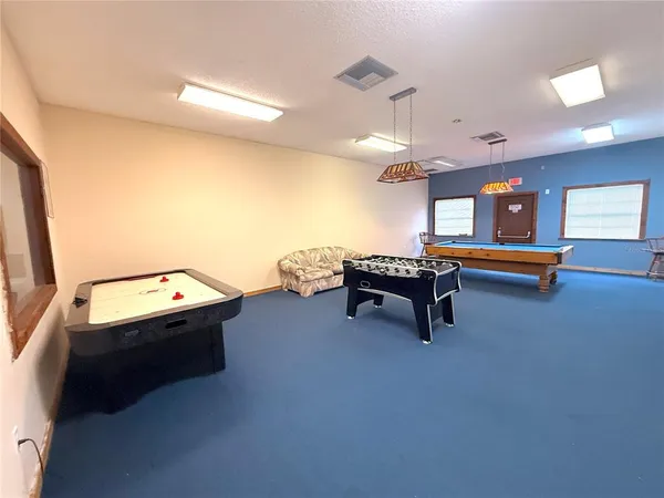 a view of a kitchen and a window