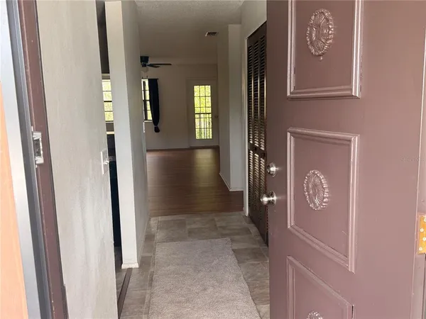 a view of a house with a swimming pool