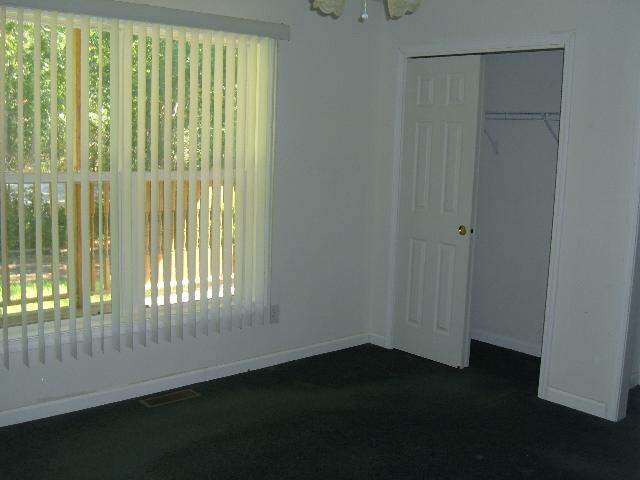 4021 Ridge Avenue Egg Harbor Township, NJ 08234 - Photo 4 of 6 a view of an empty room and wooden floor and windows