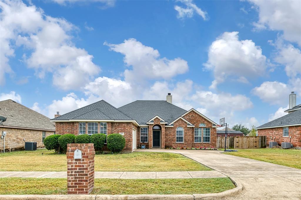 105 Waterview Parkway Red Oak, TX 75154 - Photo 1 of 1 a front view of a house with a yard