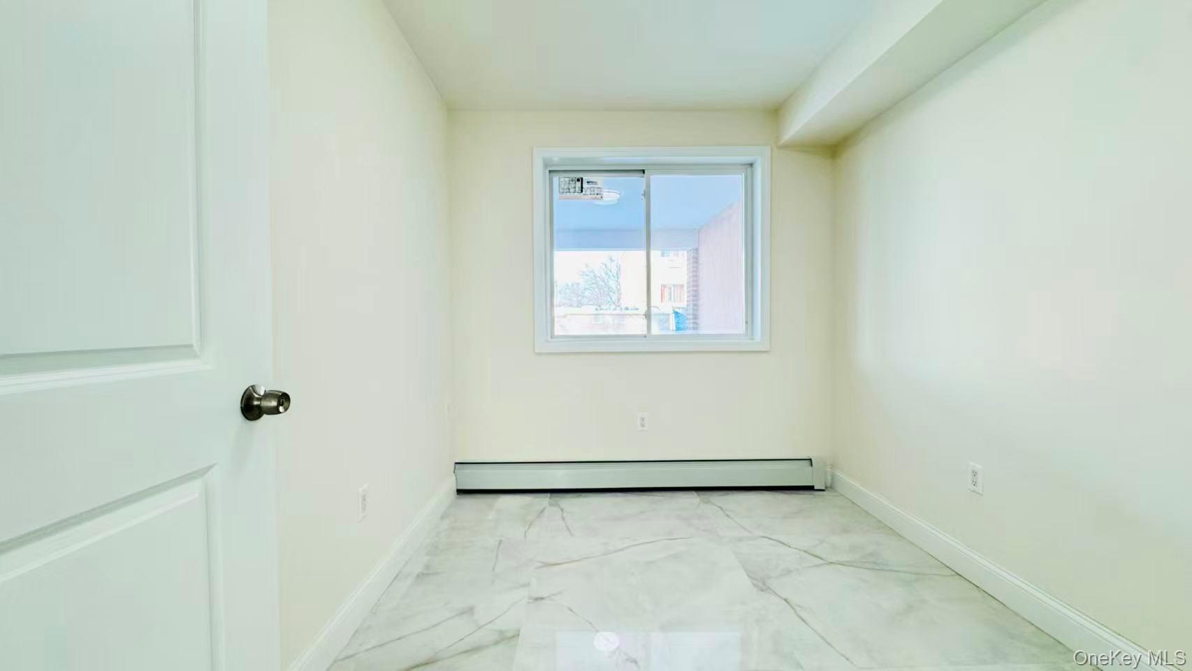 107-47 49th Avenue Queens, NY 11368 - Photo 11 of 41 a view of an empty room