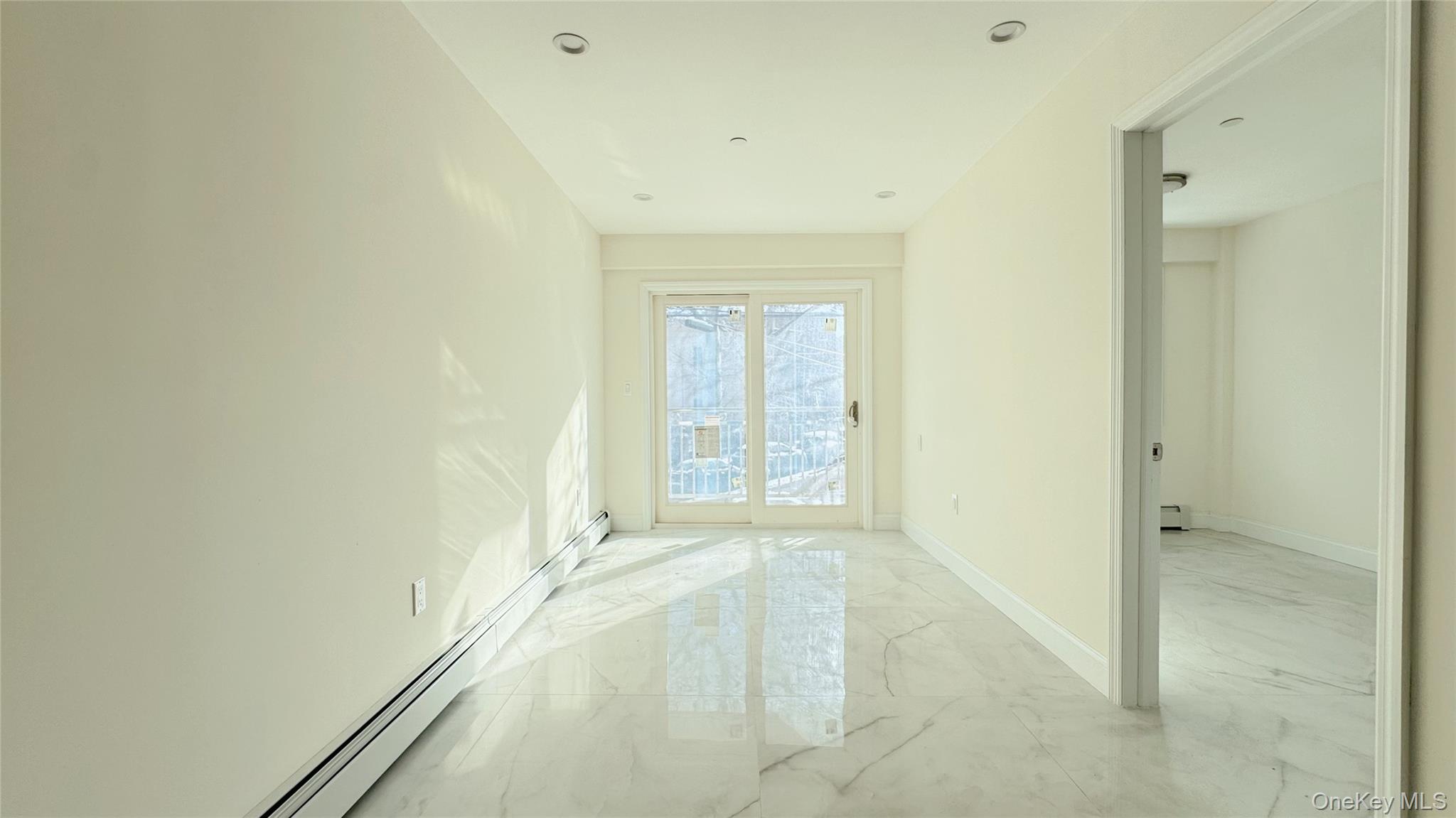 107-47 49th Avenue Queens, NY 11368 - Photo 16 of 41 a view of an empty room