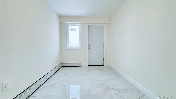 an empty room with a window