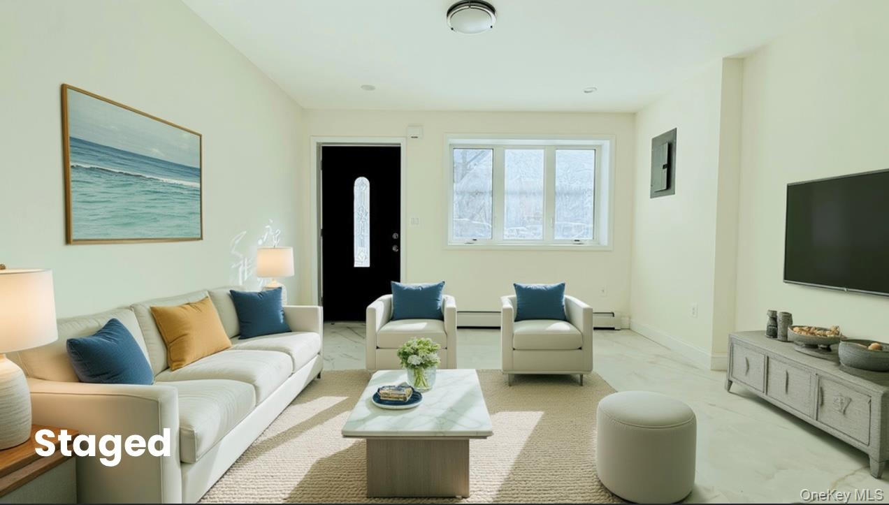 107-47 49th Avenue Queens, NY 11368 - Photo 2 of 41 a living room with furniture and a flat screen tv