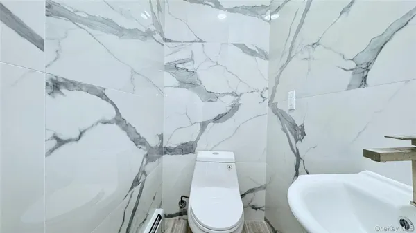 a bathroom with a bathtub and sink