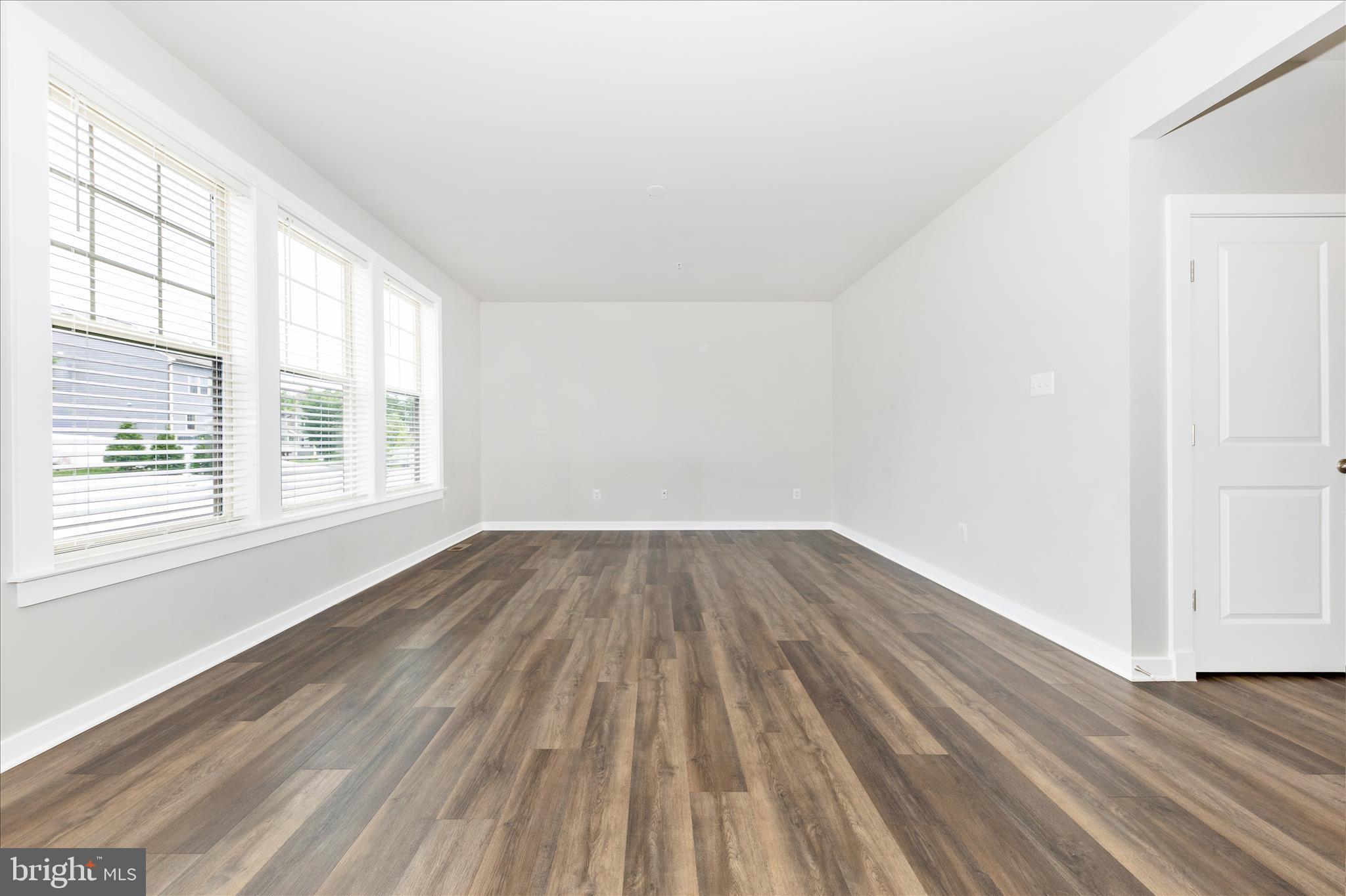 2003 Foster Way Frederick, MD 21702 - Photo 17 of 74 wooden floor in an empty room with a window