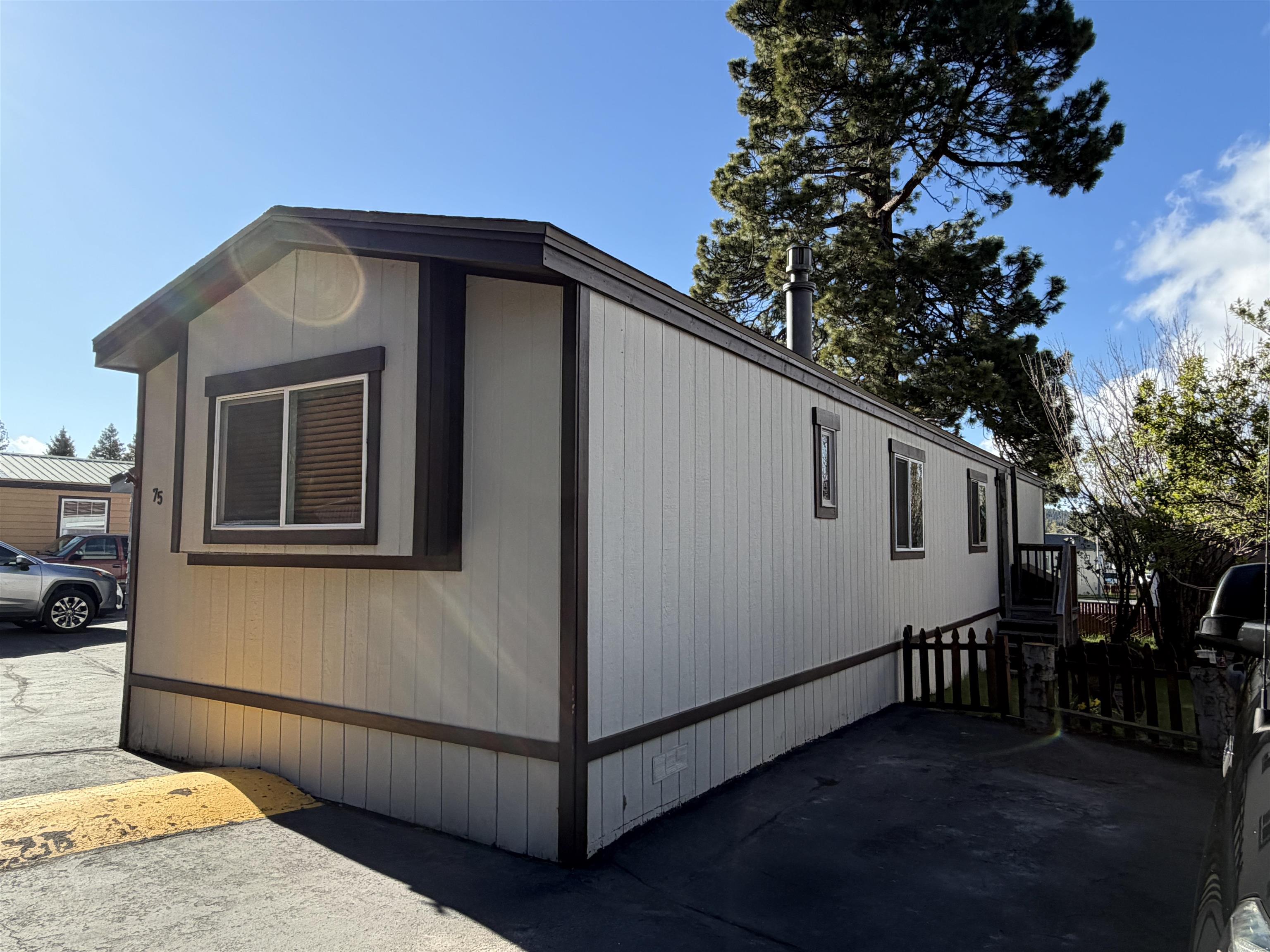 11070 Brockway Road, Unit 75 Truckee, CA 96161 - Photo 2 of 15 a back view of a house with a large window