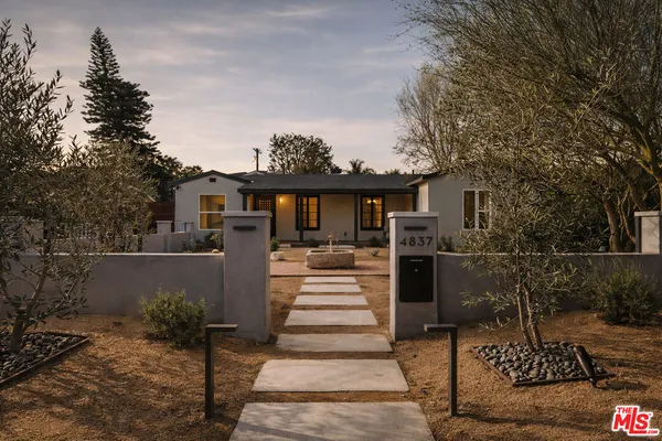 a front view of a house with a porch