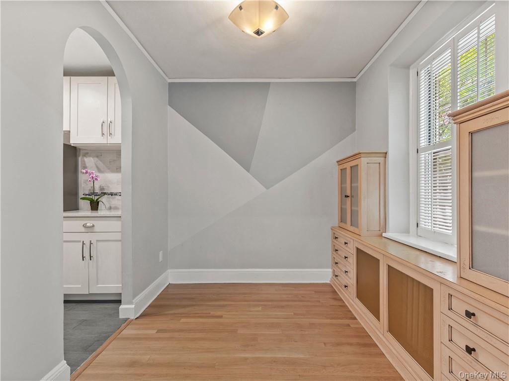 270 Bronxville Road, Unit B43 Bronxville, NY 10708 - Photo 13 of 36 a view of a hallway with wooden floor and cabinet
