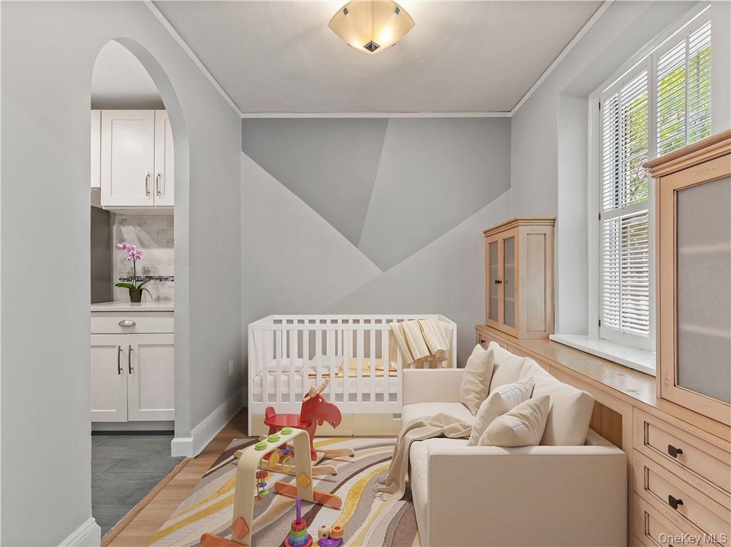 270 Bronxville Road, Unit B43 Bronxville, NY 10708 - Photo 17 of 36 a bedroom with furniture and a window