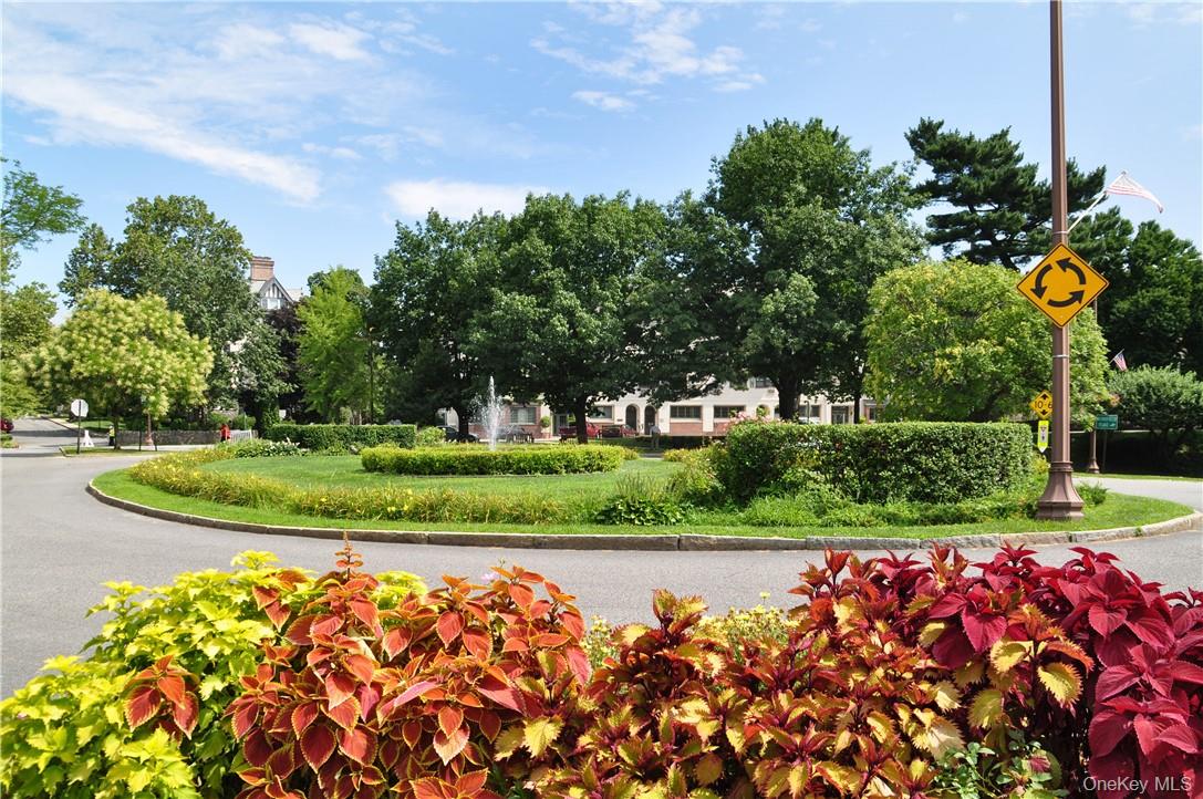 270 Bronxville Road, Unit B43 Bronxville, NY 10708 - Photo 31 of 36 a view of a park with plants and a fountain