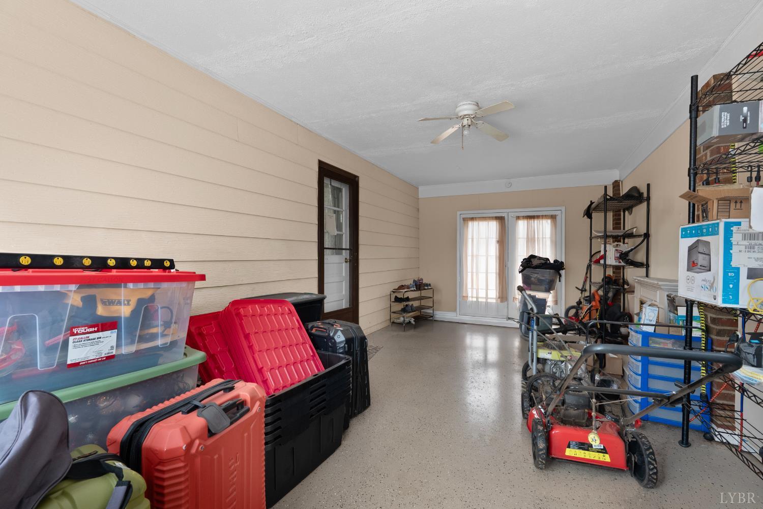 969 Hawkins Road Evington, VA 24550 - Photo 11 of 40 a living room with furniture a bed and a window