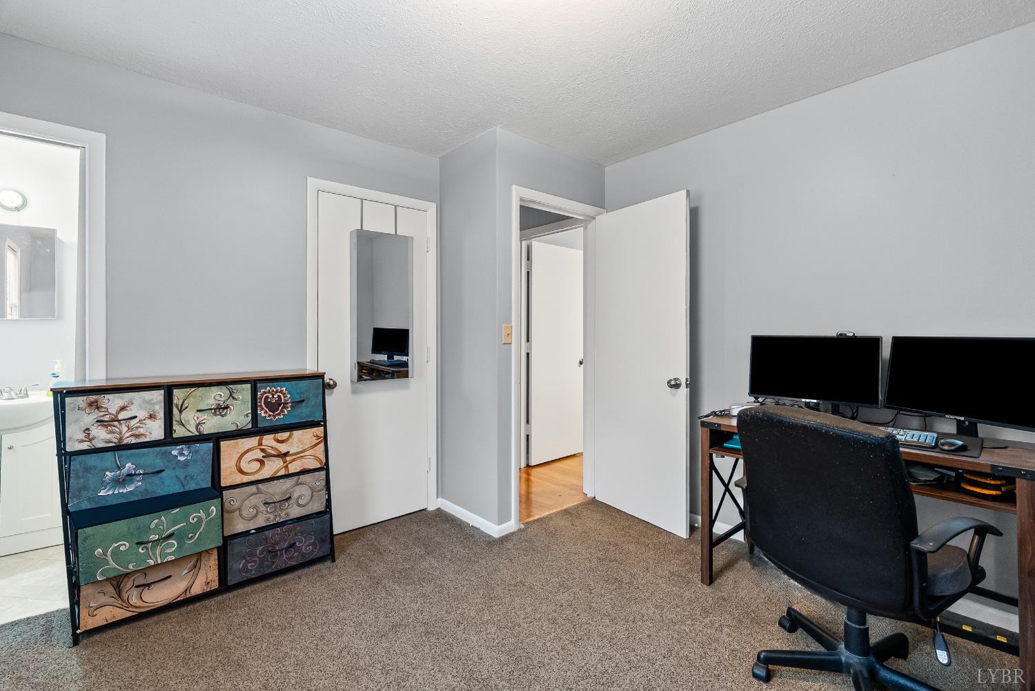 969 Hawkins Road Evington, VA 24550 - Photo 16 of 40 a view of a workspace with furniture and toys
