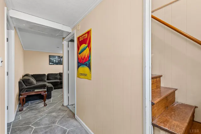 a living room with furniture and a rug
