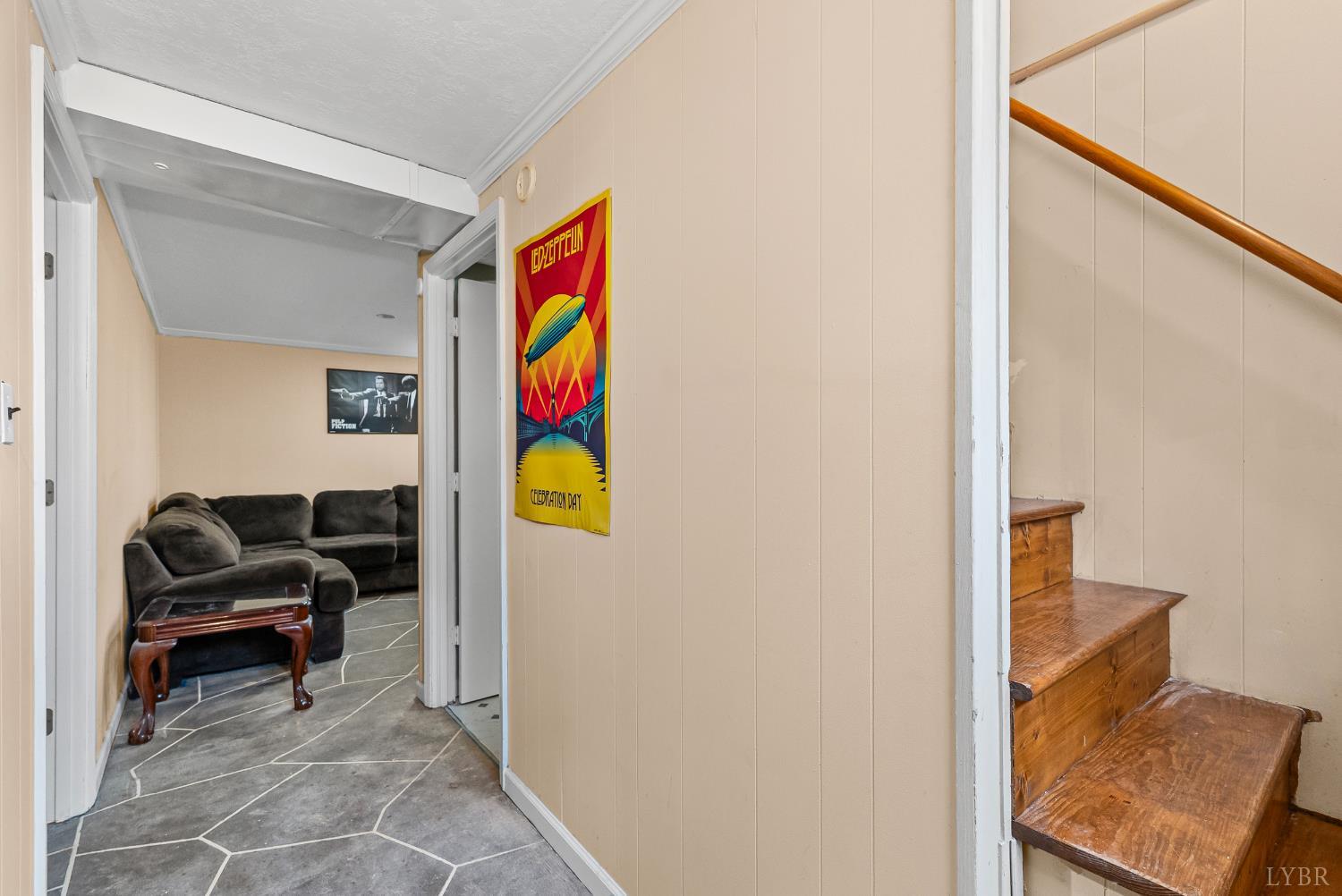 969 Hawkins Road Evington, VA 24550 - Photo 18 of 40 a living room with furniture and a rug