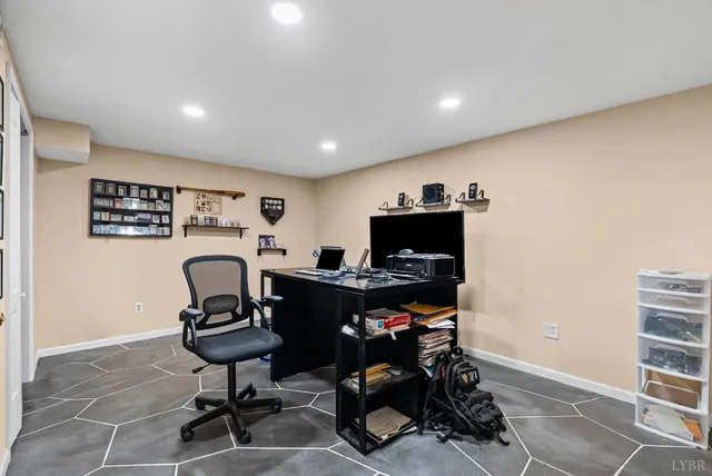 a view of a workspace with furniture